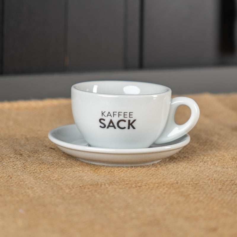 Espressotasse + Untertasse - Kaffeesack. Die Rösterei